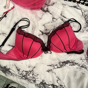 Cutest pink black burlesque bra rare ONE in the world no size or tags but new!!!